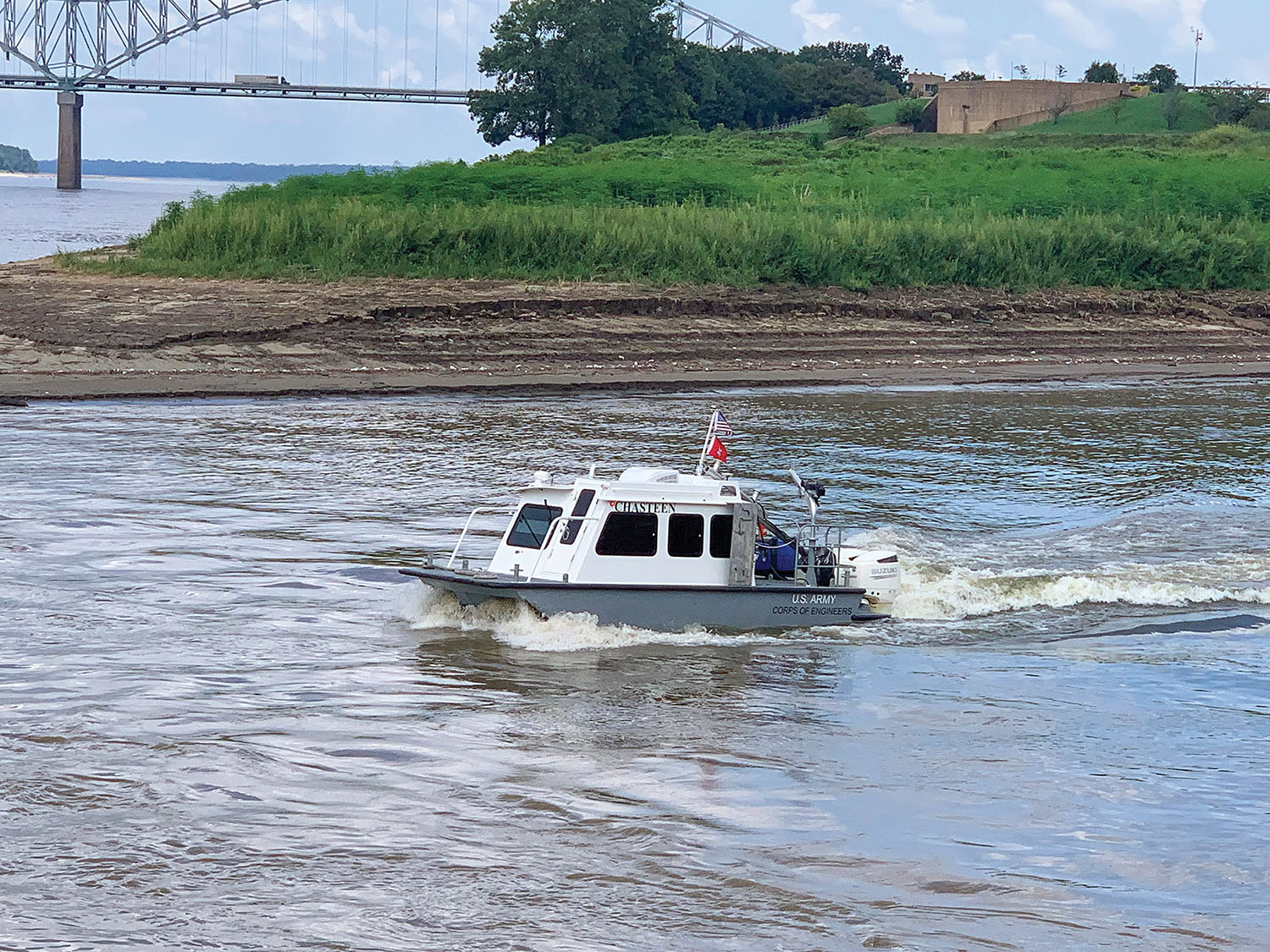 The survey vessel Chasteen launches for the first time, departing from the christening ceremony. (Photo courtesy of the Memphis Engineer District)