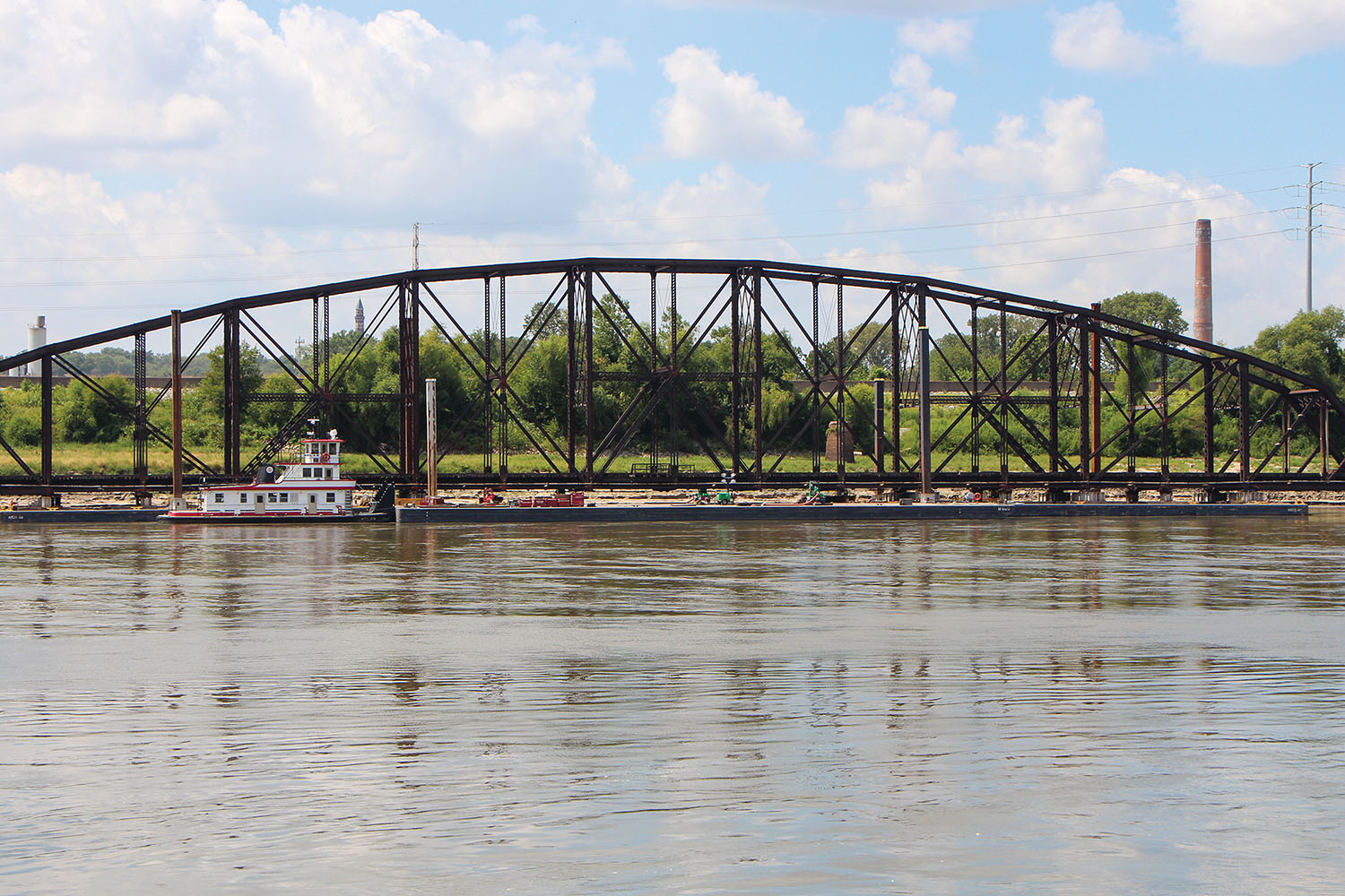 The final truss for the Merchants Bridge replacement project is floated into place. (Photo by David Murray)
