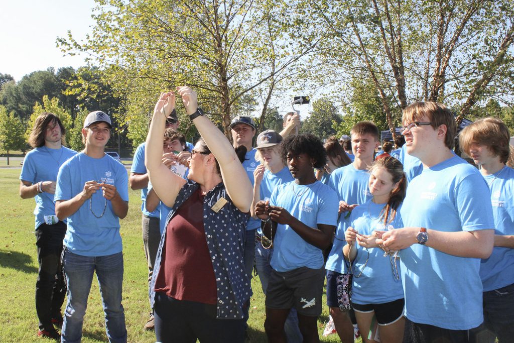 Students learn how to tie simple knots. (Photo by Shelley Byrne)