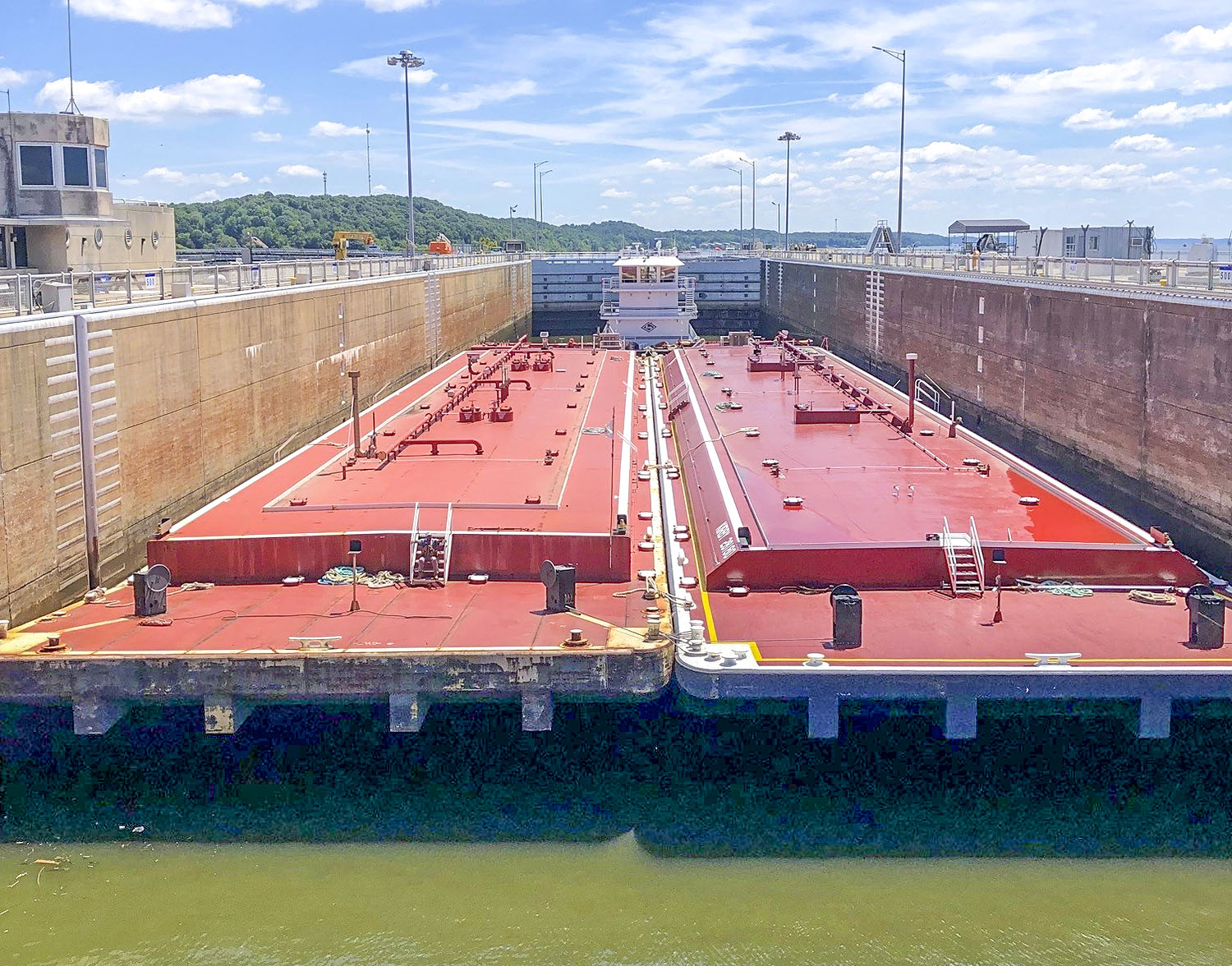A downbound tow locks empty chemical barges through the Kentucky Lock on August 12. (Photo courtesy of Lockmaster Caleb Skinner)