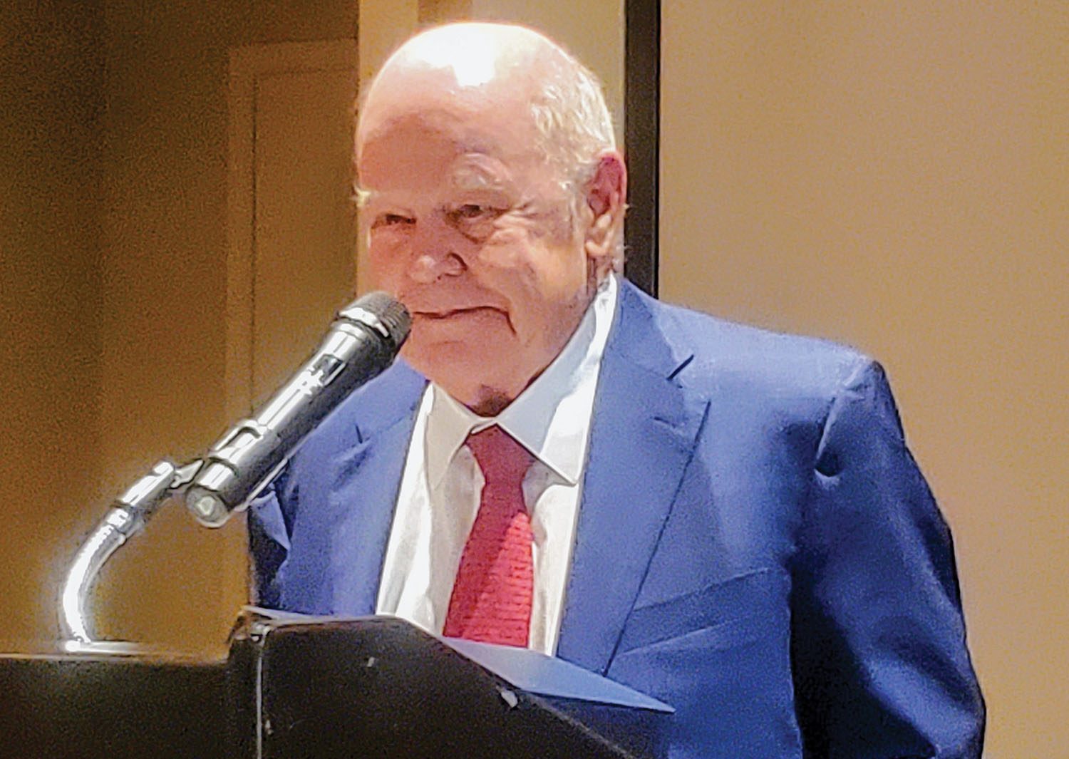 Walter Blessey Jr. accepts the Maritime Person of the Year award from the New Orleans Propeller Club. (Photo by Richard Eberhardt)
