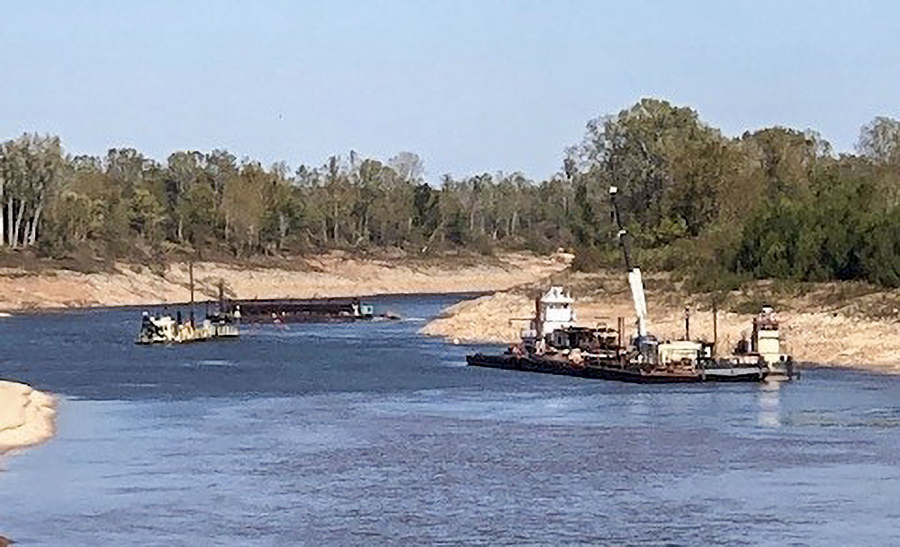 Dredge Dubuque at work in the lower approach to Lock 1 on the Red River. (Photo courtesy of Vicksburg Engineer District)