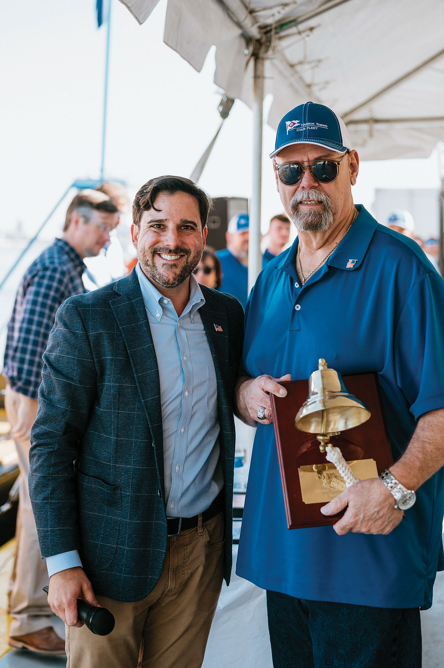 Todd and guy with bell