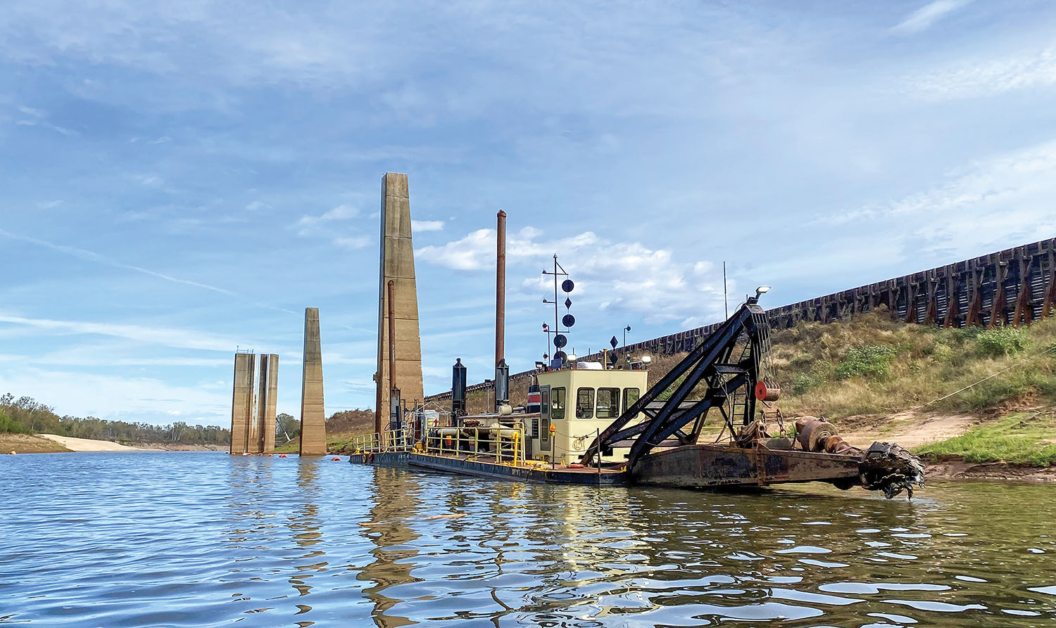 The cutterhead dredge Dubuque works on the lower Red River. (Vicksburg Engineer District photo)