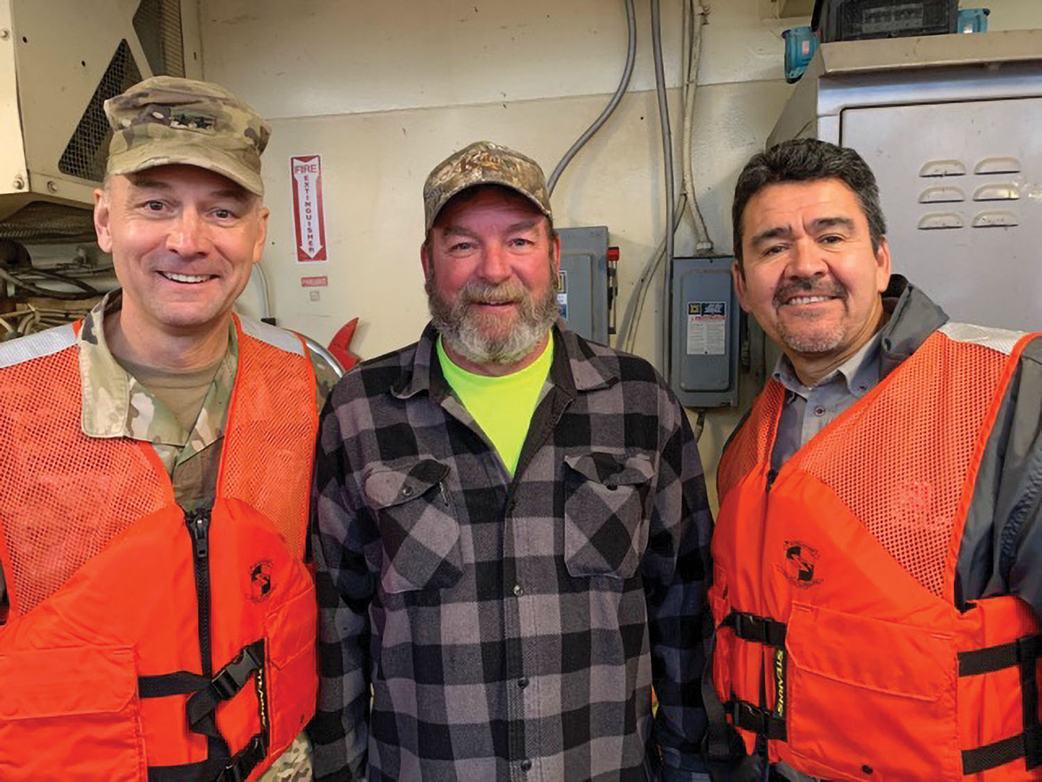 From left, Corps Deputy Commanding General William “Butch” Graham; Brian Ragsdale, master of the Dredge Potter; and Assisstant Secretary of the Army-Civil Works Michael Connor. (Photo courtesy of St. Louis Engineer District)