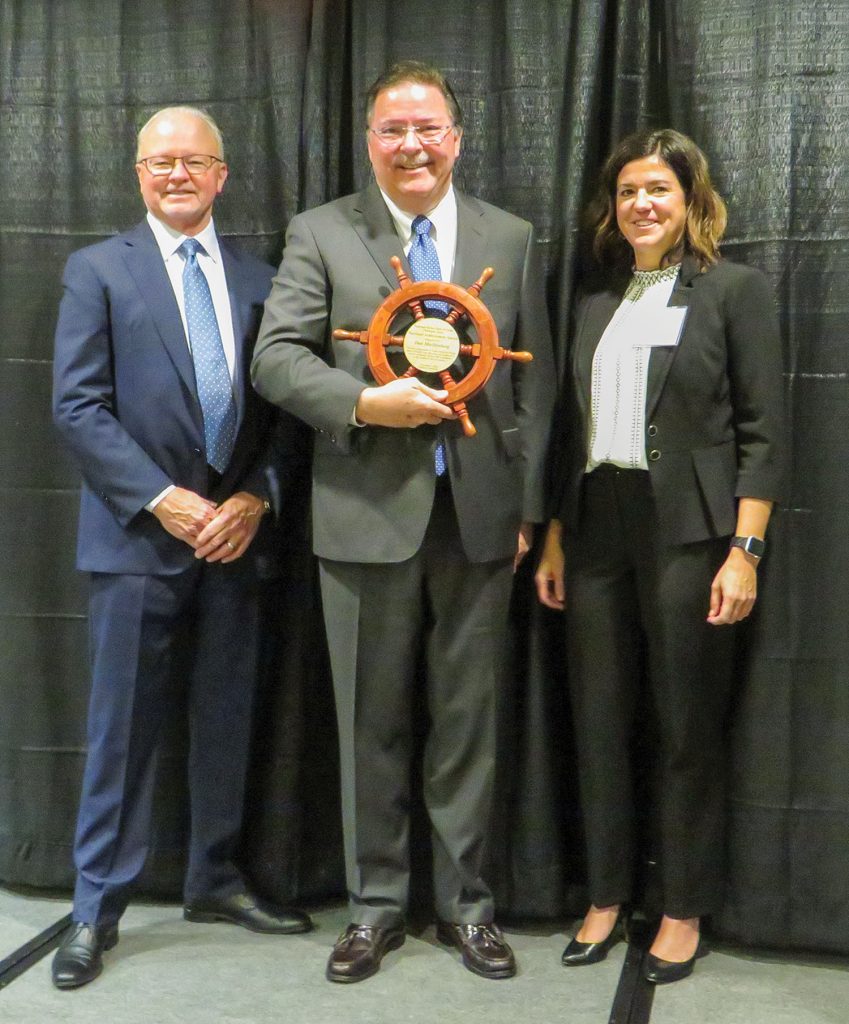 Left to right:  Kurt Strand, National Mississippi River Museum and Aquarium president; Dan Mecklenborg; and Errin Howard, executive director, RiverWorks Discovery. (Photo courtesy of Waterways Council Inc.)