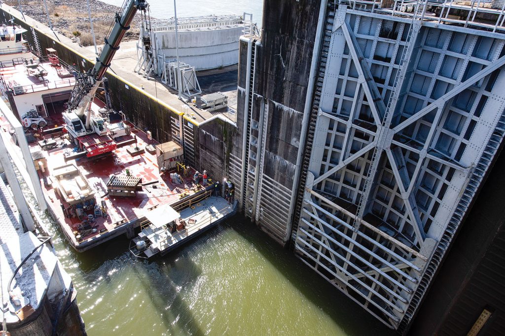 The Nashville Engineer District’s maintenance support team works to repair the needle-dam-girder beam slot at Watts Bar Lock. (Photos courtesy of Lee Roberts/Nashville Engineer District)