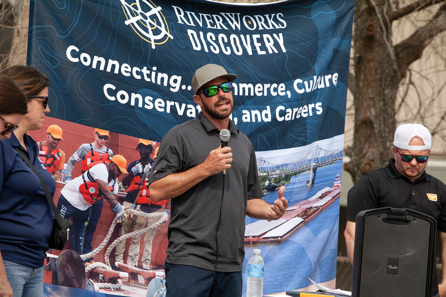 Lloyd Trosclair, safety and training specialist for Turn Services, speaks at YouthForce career expo in New Orleans March 7. (Photo by Frank McCormack)