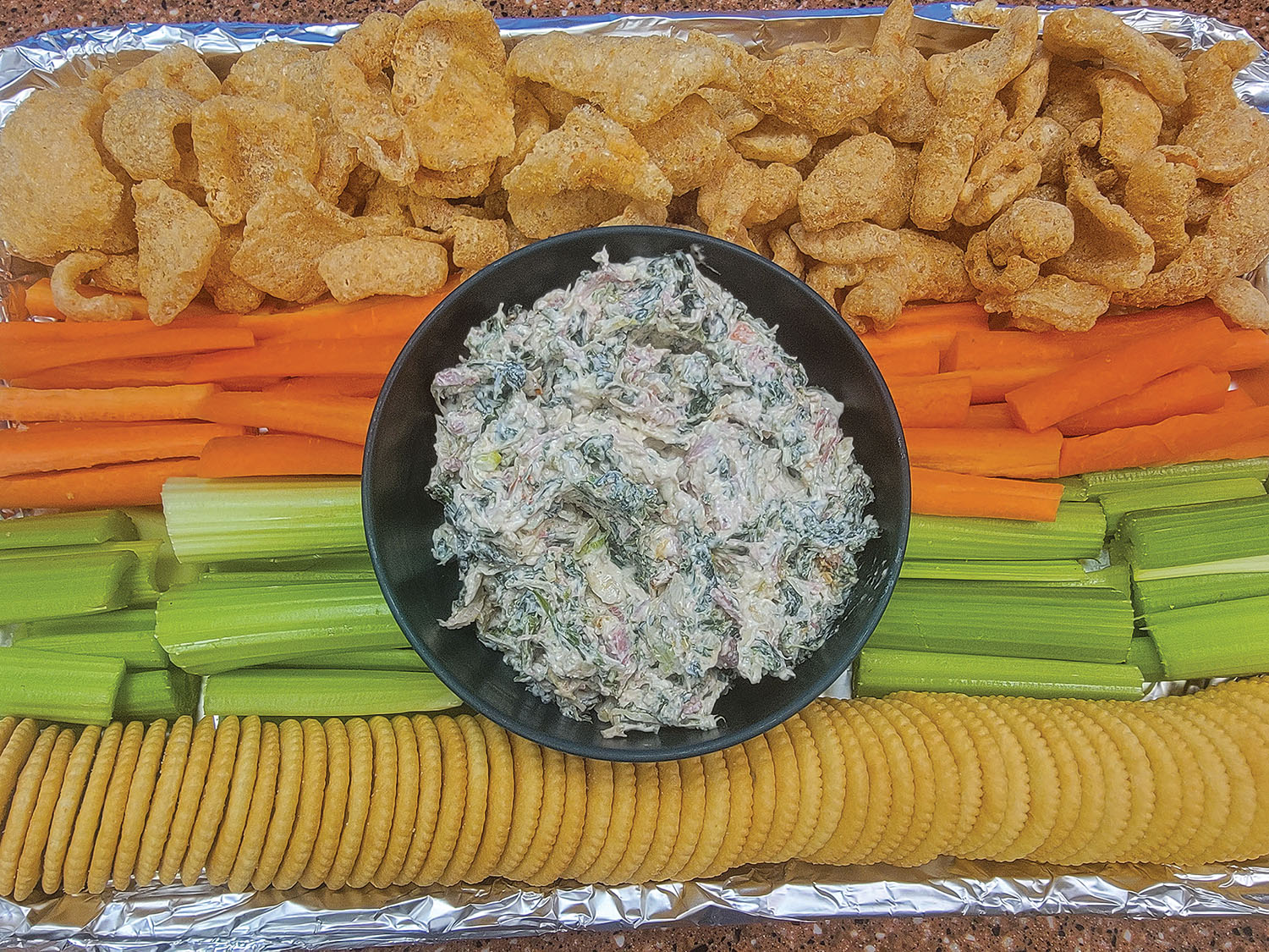 Spinach dip with corned beef and sauerkraut.