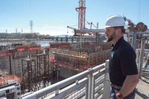 Peter Serodino IV, Serodino, Inc., overlooks construction of the lock chamber for the Chickamauga Lock Replacement Project during a tour March 20 of the active navigation lock on the Tennessee River in Chattanooga, Tenn. (USACE photo by Lee Roberts)