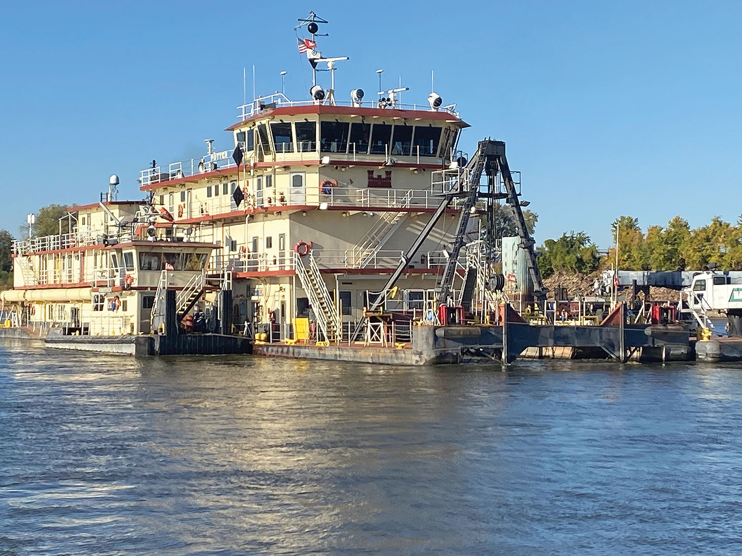 The St. Louis Engineer District’s Dredge Potter, assisted by the Kimmswick, worked 24/7 through the 2022-23 dredging season on the Mississippi River. The Potter, built in 1932, is a dustpan dredge. The Kimmswick, commissioned in 2006, assists the dredge with pipeline movements. (photo by Janet Meredith/St. Louis Engineer District)