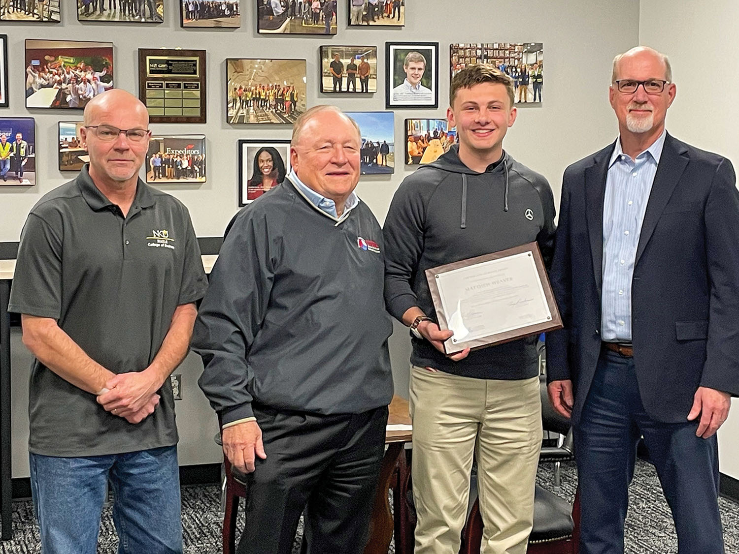 The Central Ohio River Business Association recently awarded a $1,000 scholarship to Northern Kentucky University student Matthew Weaver. Pictured (left to right) are Mark Thackeray, NKU director – Global Supply Chain Management Degree Program; Doug Ruschman, CORBA chairman; Matthew Weaver, NKU student and scholarship recipient; and Eric Thomas, CORBA executive director. (Photo courtesy of CORBA)