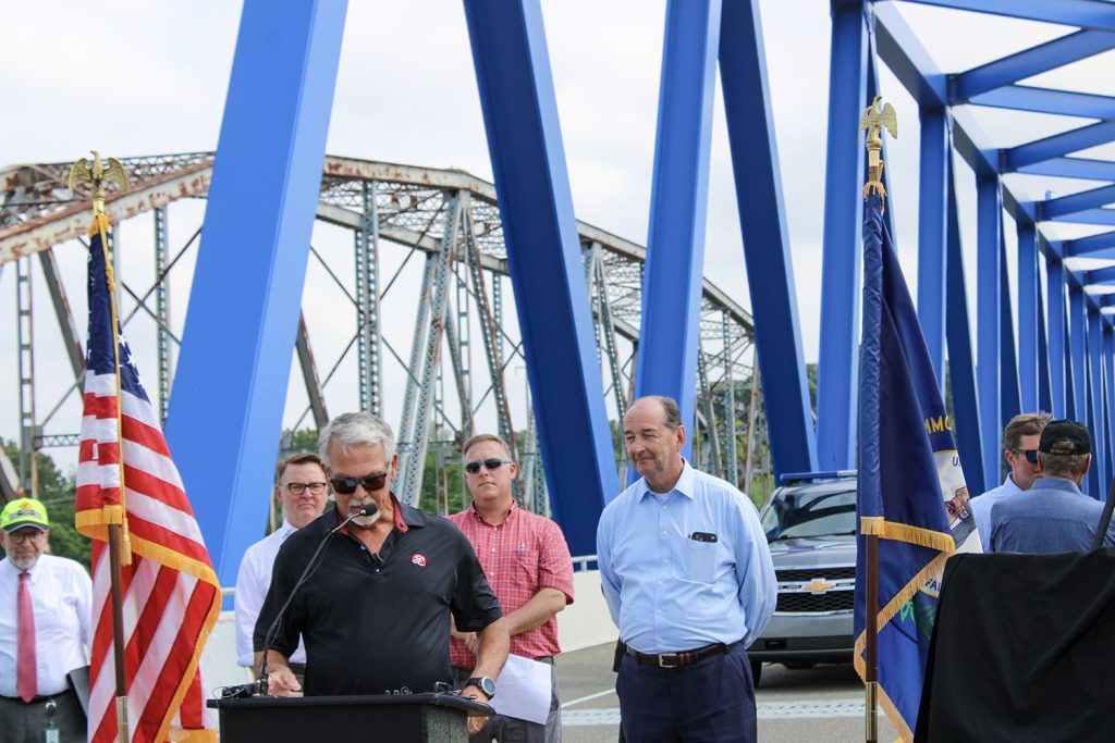 The ceremony included the announcement of the bridge’s name, which was approved by the Kentucky General Assembly last year. The Jim R. Smith Memorial Bridge honors the founder of Jim Smith Contracting Company. His son, Rex Smith, the company’s president, spoke about his father and his legacy. (Photo by Shelley Byrne)