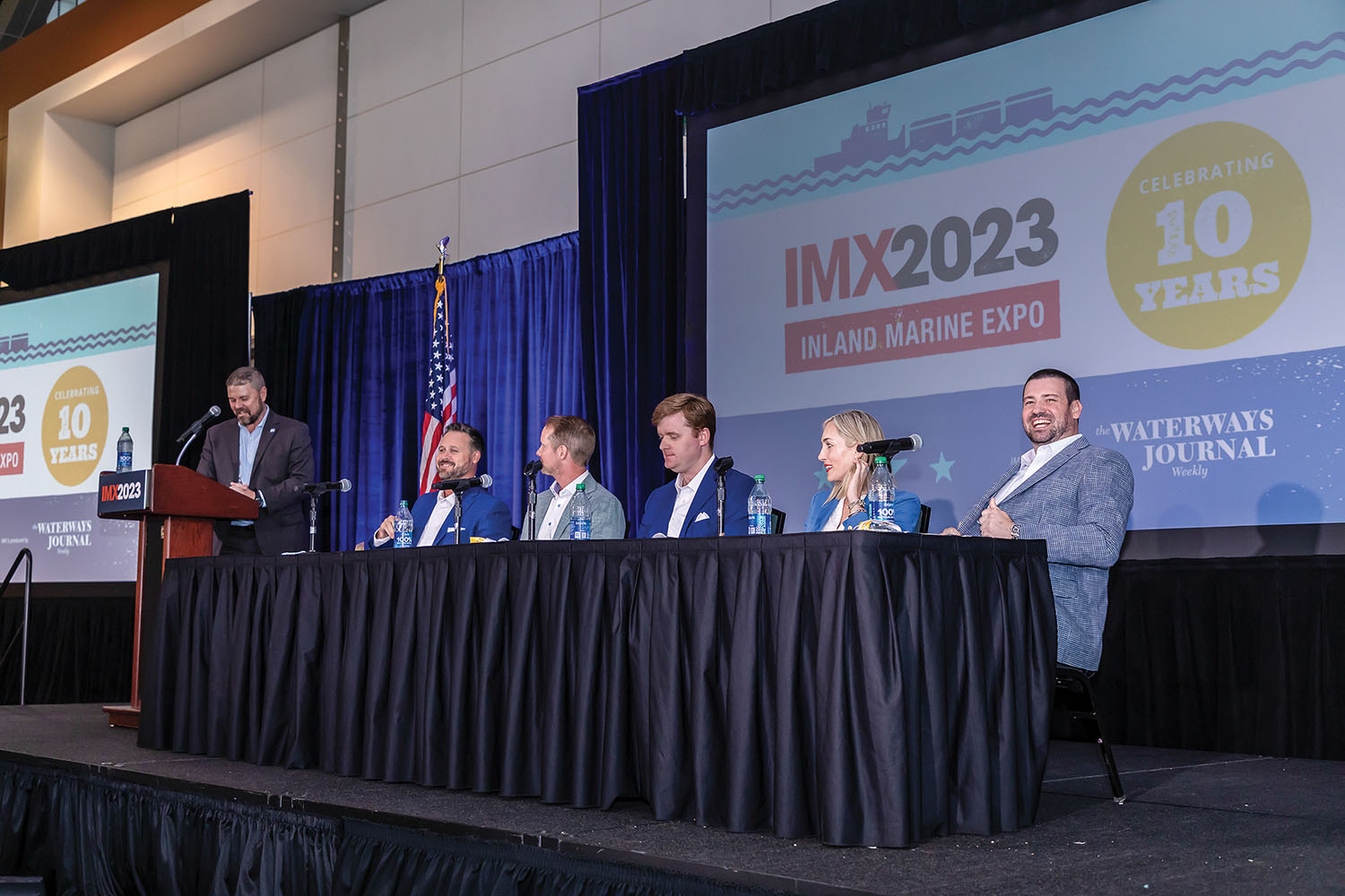 Mike Breslin, director of safety and sustainability for the American Waterways Operators, interviews a panel of past 40 Under 40 recipients at this year’s Inland Marine Expo. Panelists included, from the left, Tim Parker III, president and CEO of Parker Towing; Kent Furlong, president of Hines Furlong Line; James Fowler, managing director of Cooper Marine and executive vice president of Blakeley Boatworks; Kasey Eckstein, president of Eckstein Trade & Transport and Eckstein Fleeting Services; and Tracy Zea, president and CEO of Waterways Council Inc. (Waterways Journal photo)