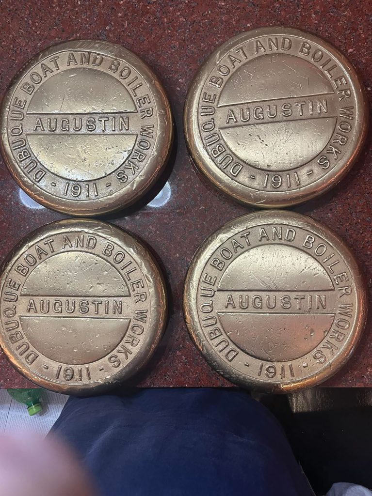 Lieut. Augustin bitt caps in Tom Cook collection. (Courtesy of Tom Cook)