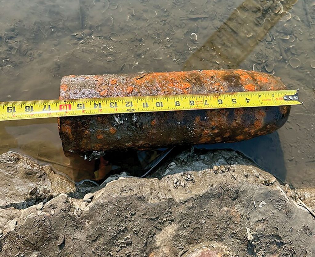 A Civil War-era parrot round was discovered on the bottom of the Brandon Road Lock during the dewatering. (Photo courtesy of the Rock Island Engineer District.)