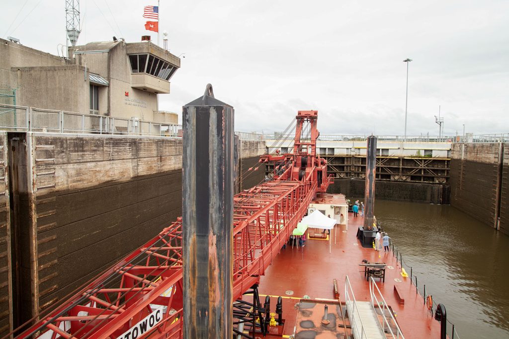 The mv. Tenn-Tom and crane barge R.W. Davis lock through Stennis Lock October 6 during a familiarization tour for waterway stakeholders. (Photo by Frank McCormack)