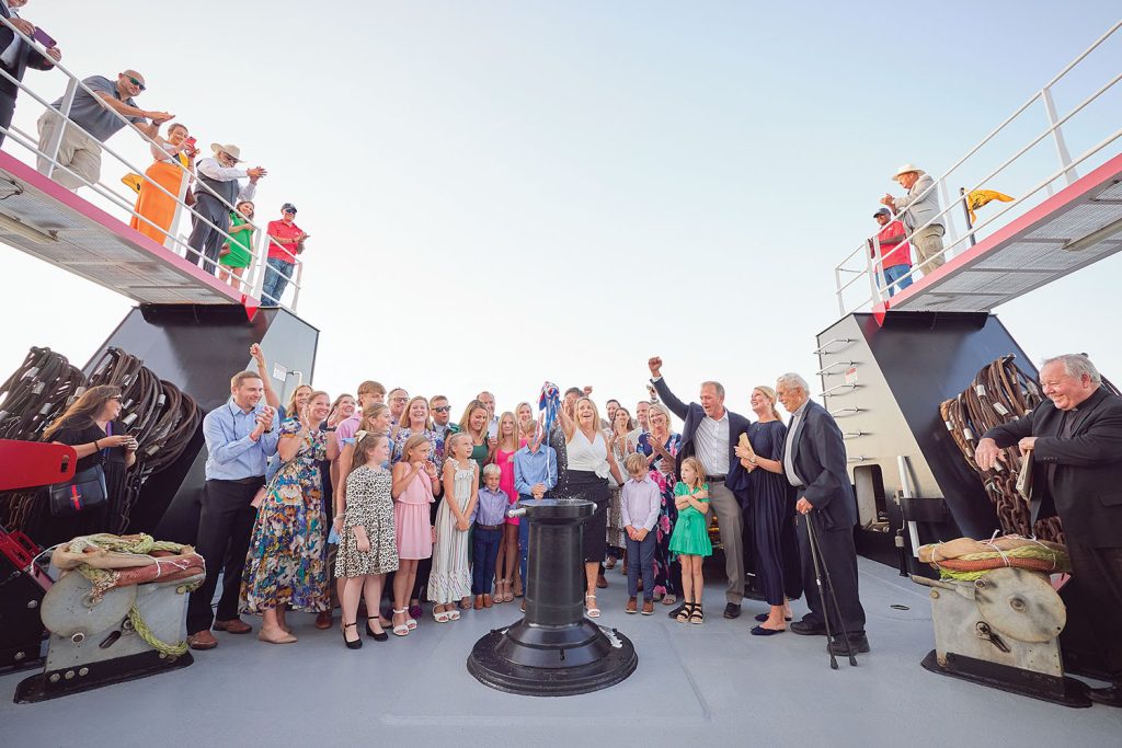 Cindy Erickson christens the mv. Cindy L. Erickson to cap off the September 9 ceremony on the Paducah riverfront. (Photo by Brad Rankin)