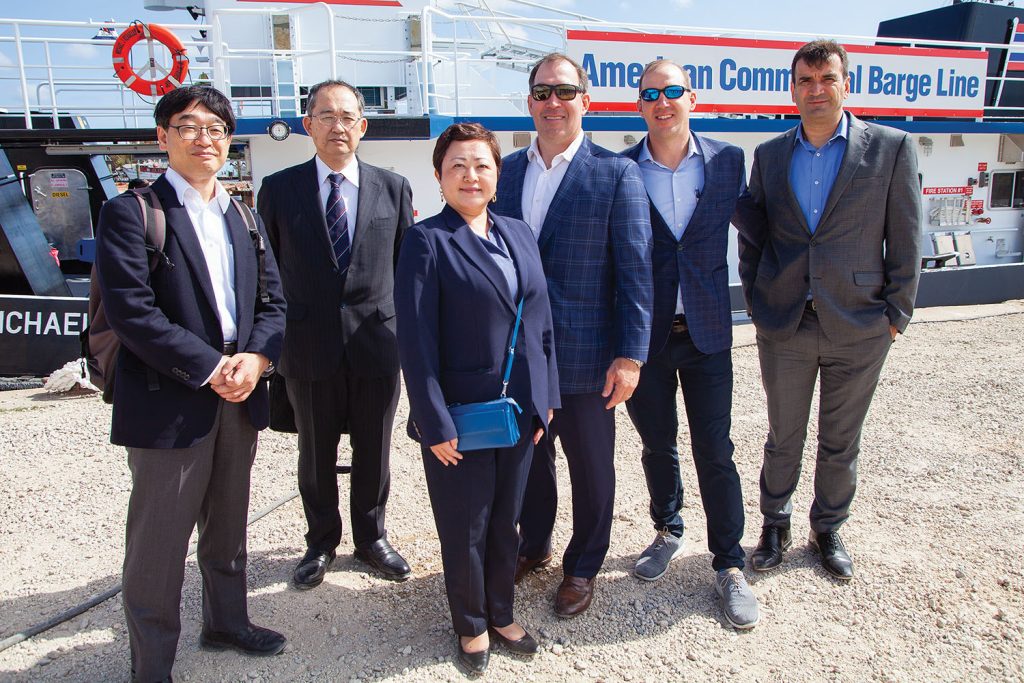 From left: Tatsuro Usuki, president of Mitsubishi Heavy Industries Engine & Turbocharger (MHIET); Kazuhiro Aruga, senior general manager, Engine & Energy Division, MHIET; Emiko Ikari, sales team manager, MHIET; Brian Laborde, president and CEO of Laborde Products; Trace Laborde, vice president of sales for Laborde Products; and Rodrigo Teixeira, marine sales manager for Mitsubishi Turbocharger & Engine North America. (Photo by Frank McCormack)