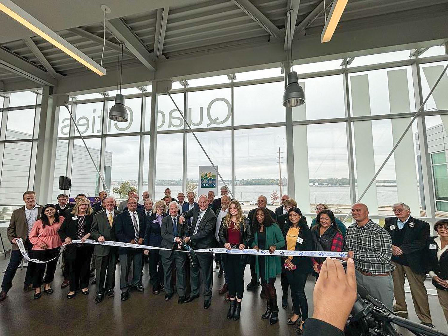 Corn Belt Ports officials and representatives of local elected officials cut the ribbon to officially open the Corn Belt Ports office on the campus of Western Illinois University in Moline, Ill.