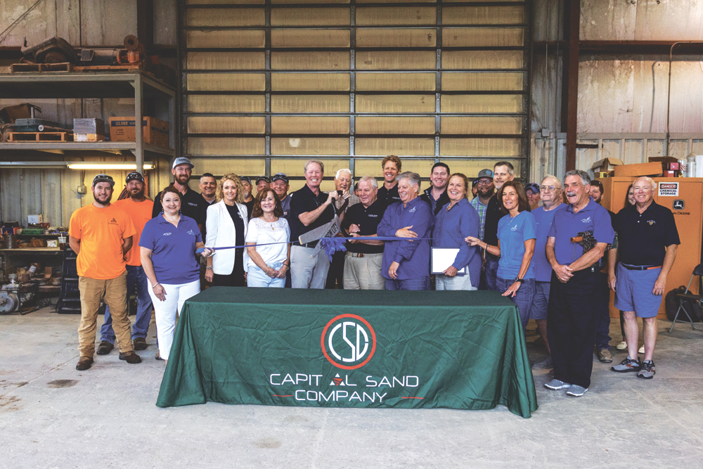 Employees, at the heart of Capital Sand’s 50 years of growth, pose August 9 for a group shot at the ribbon-cutting and 50th anniversary celebration. (photos courtesy of Capital Sand Company)
