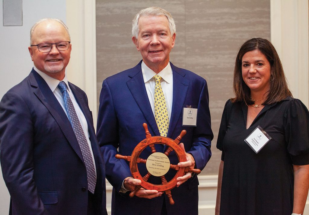 Kurt Strand and Errin Howard present Hall of Fame National Achievement Award to Steve Golding, center.(Photo by Frank McCormack)