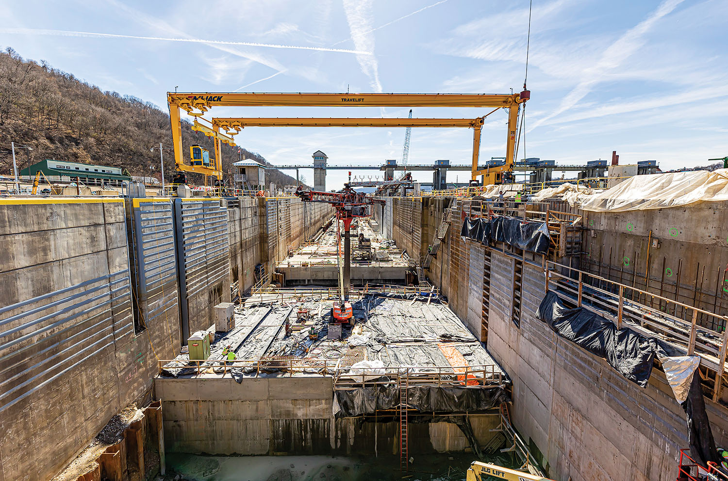 A key component of the Corps’ Lower Monongahela Project, the new chamber at Charleroi Lock and Dam is nearly complete. This picture was taken in March; the chamber was scheduled to be filled with water in late May, with it being operational early in 2024. (Photo courtesy of Pittsburgh Engineer District)