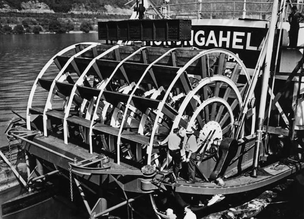 Rebuilt sternwheel being placed at American Bridge in 1946. Men on fantail highlight how huge these wheels were. (American Bridge photo courtesy of the S&D Reflector)