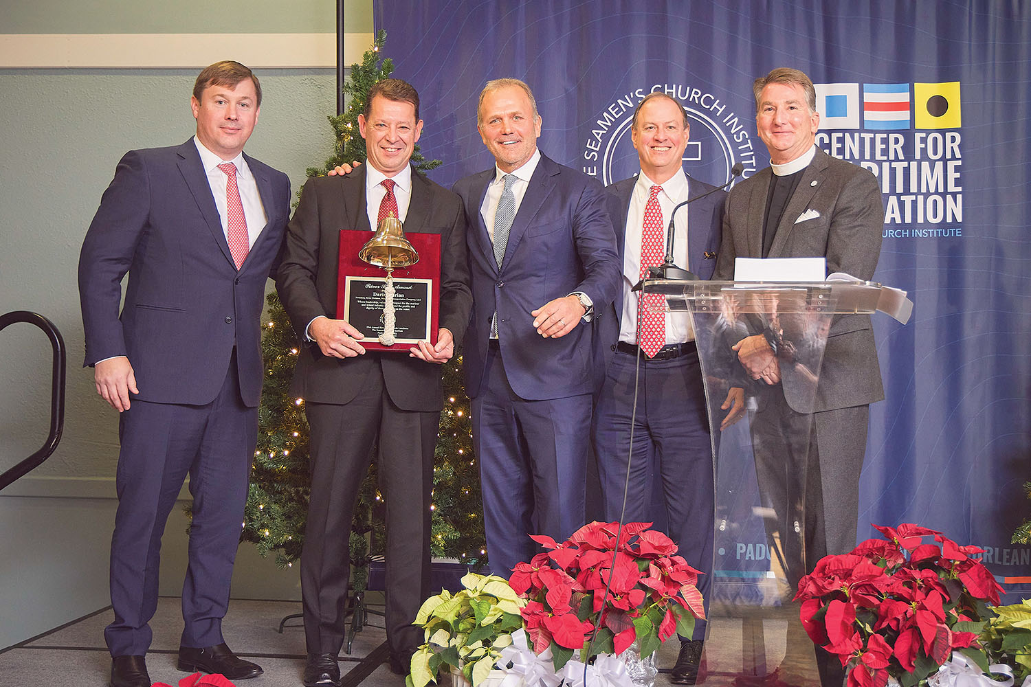 From left: Damon Judd, president and CEO of Marquette Transportation Company; River Bell Award recipient Darin Adrian, Marquette president-river division; John Eckstein, Marquette executive chairman; Merritt Lane, president and CEO of Canal Barge Company; and the Rev. Mark Nestlehutt, president and executive director of SCI. (Photo courtesy of Seamen's Church Institute)