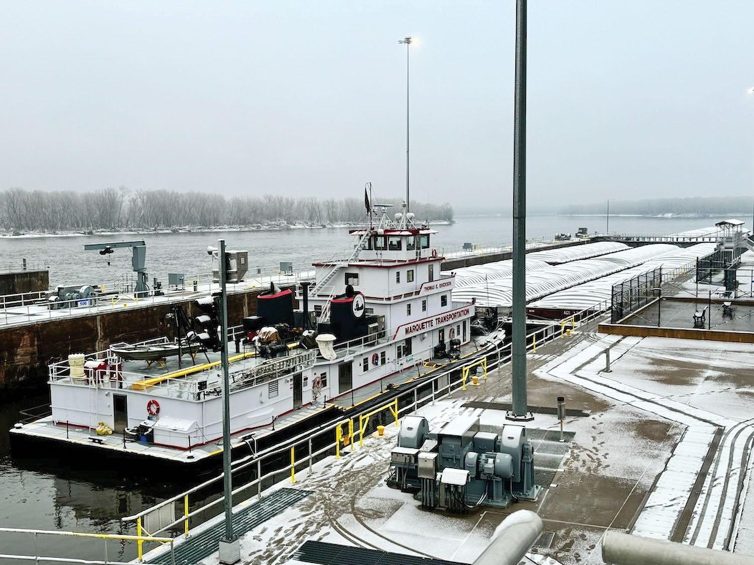 The mv. Thomas E. Erickson was the “last boat out” for the 2023 Upper Mississippi navigation season, transiting Lock and Dam 10 near Guttenberg, Iowa, on December 3. (Photo courtesy of St. Paul Engineer District)