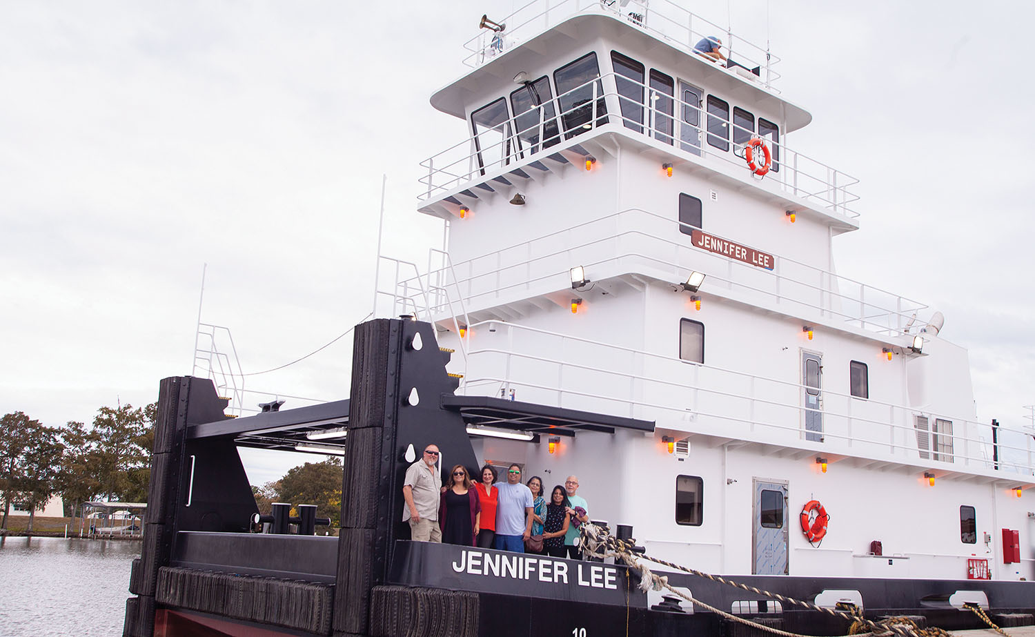 The mv. Jennifer Lee was constructed by C&C Marine & Repair in Belle Chasse, La. Shown on the bow are namesake Jennifer Brown with family members; from left are Rob Roberts, Linda Roberts, Jennifer Brown, Luis Rivera, Elvia Ramirez, Tina Newbill and Jay Newbill. (Photo by Frank McCormack)