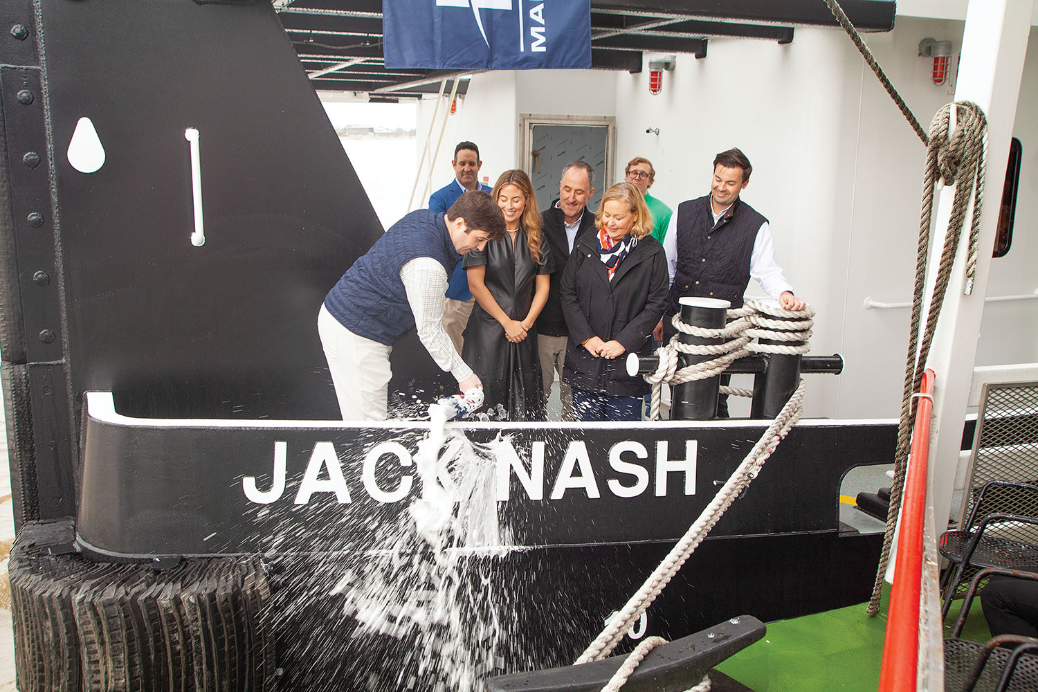 Jack Nash christens his namesake vessel. (Photo by Frank McCormack)