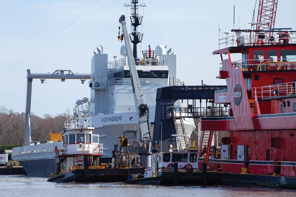 The MS Voyager, a retrofitted offshore supply vessel to be used as a marine spaceport, and Pine Bluff Sand & Gravel’s Wallace McGeorge dustpan dredge sit nose-to-nose at Conrad Shipyard in Amelia, La. (Photo by Frank McCormack)