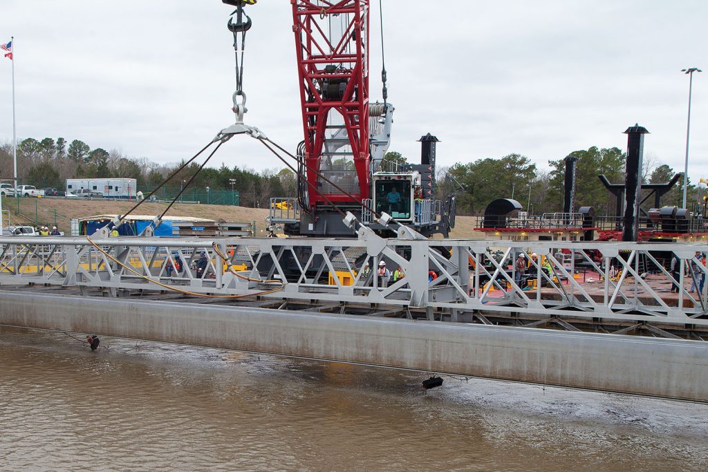 Corps of Engineers crews had to remove and reset stoplogs at Demopolis Lock last week to position vessels for the repair project, which is expected to last until May.   (Photo by Frank McCormack)