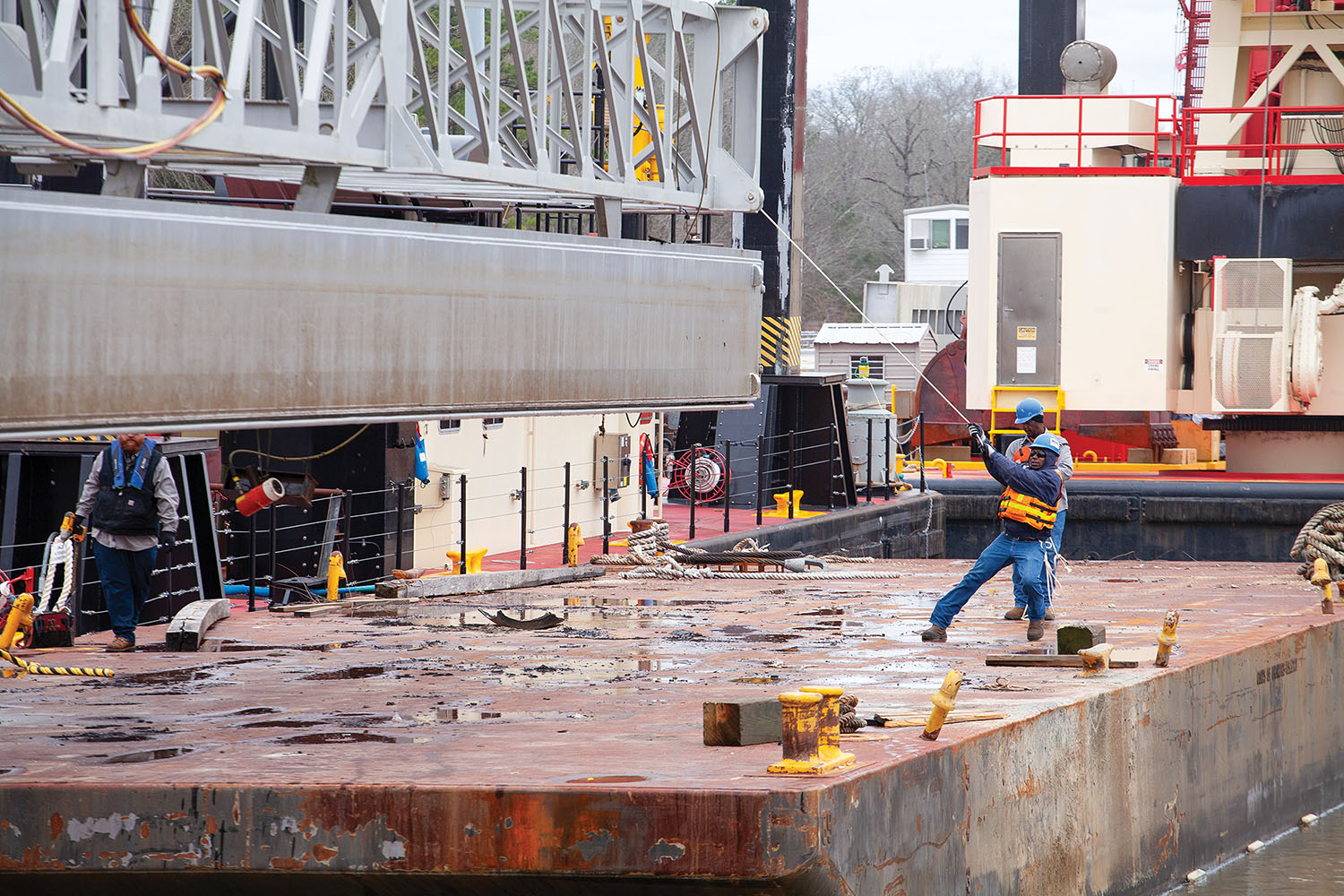 Corps of Engineers crews had to remove and reset stoplogs at Demopolis Lock last week to position vessels for the repair project, which is expected to last until May. (Photo by Frank McCormack)