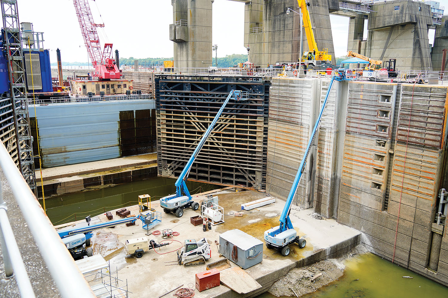 The Great Lakes and Ohio River Division’s Regional Rivers Repair Fleet work to rehab the miter gates in the 1,200-foot lock chamber at John T. Myers Locks and Dam in September. (Photo by Abby Korfhage, Louisville Engineer District)