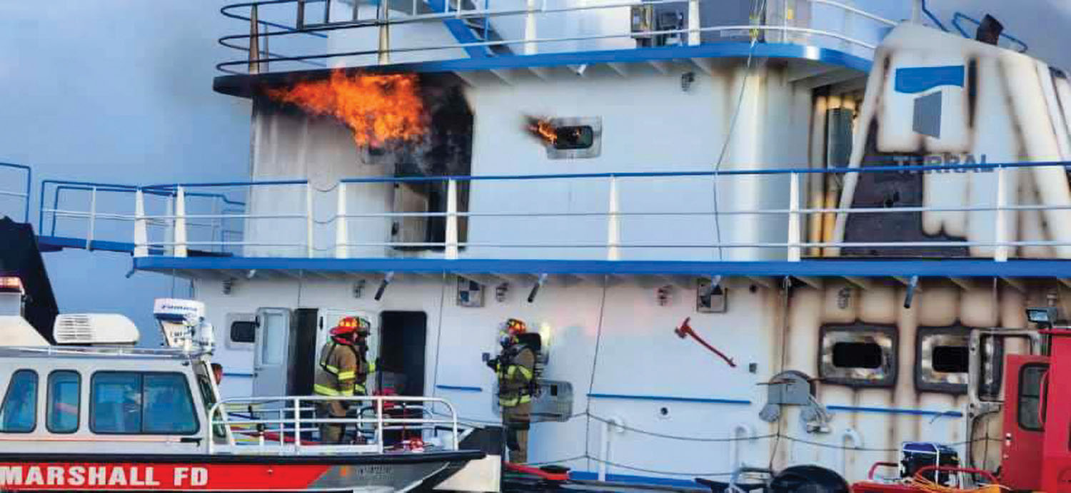 The mv. Johnny M in flames on Kentucky Lake. (Photo courtesy of Marshall County Rescue Squad)