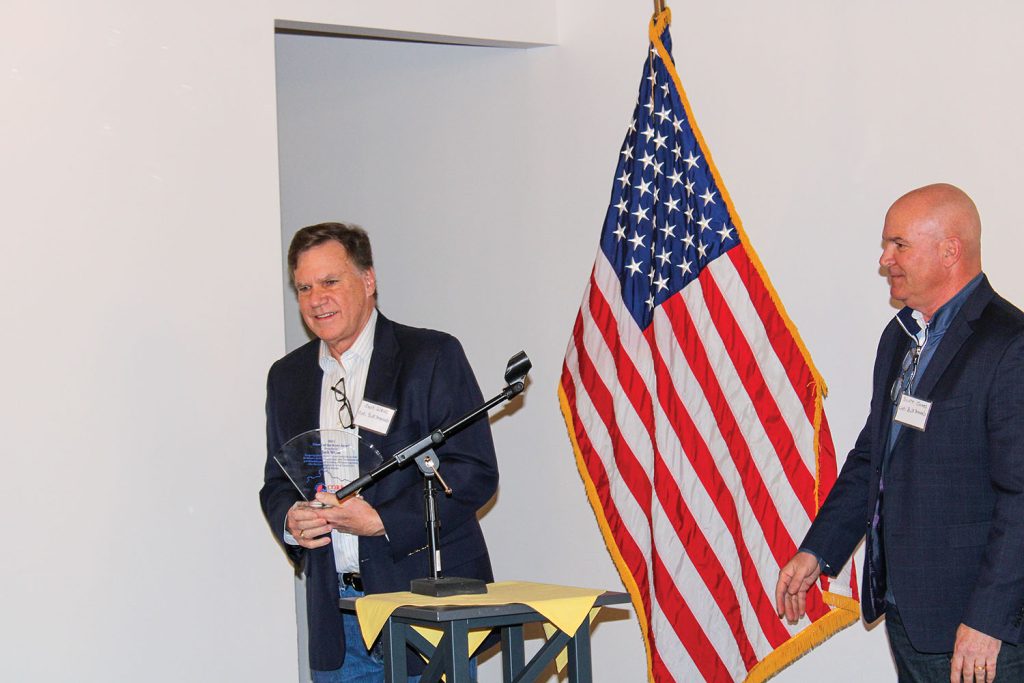 Jack Weiss (left) smiles after receiving CORBA’s Friend of the River Award from Scott James. (Photo by Shelley Byrne)