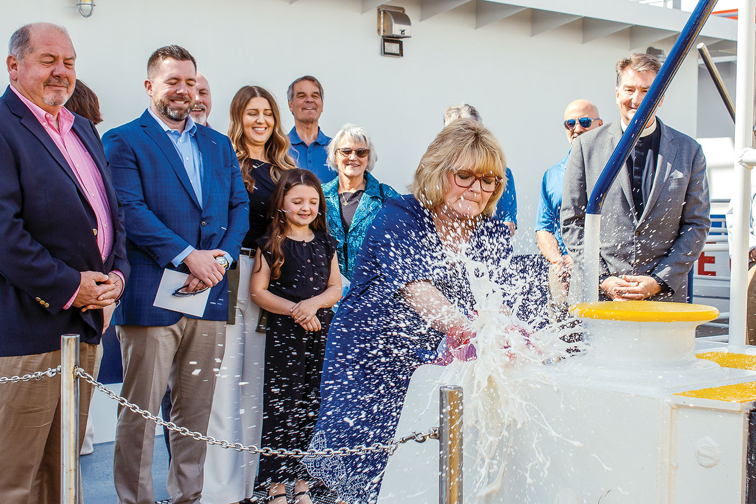 Cindy Holman christens the mv. Gary L. Holman, named for her husband, Ingram vice president-barge maintenance. (Photo courtesy of Ingram Marine Group)