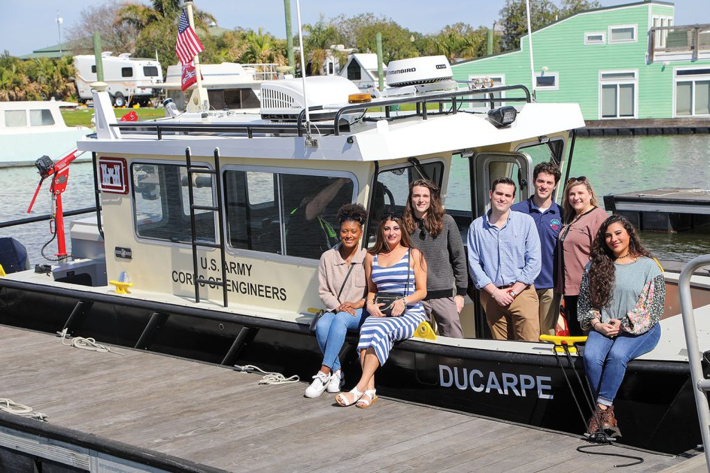 The family of Michael Ducarpe pose on the mv. Ducarpe after a christening ceremony held at Seabrook Harbor & Marine. It was named in honor of Ducarpe, who worked for the New Orleans Engineer District for more than 20 years before passing away in 2023. (U.S. Army courtesy photo)