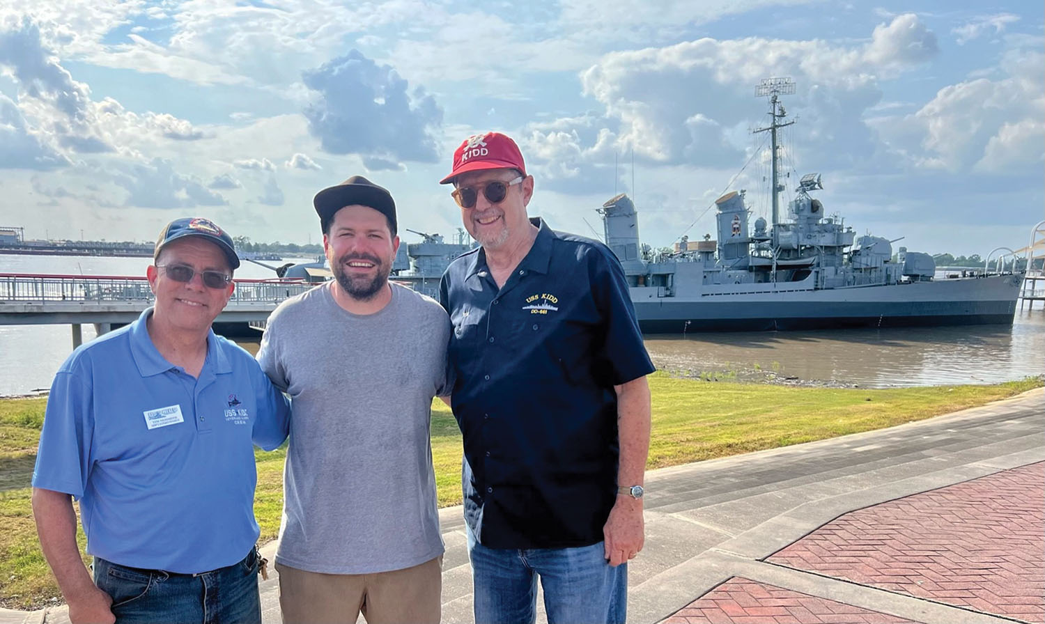 From left: Tim NesSmith, Brandon Maher and Parks Stephenson are among those involved in preparing to bring the U.S.S. Kidd to drydock and chronicling the journey in a documentary. (Photo by Elijah Otto)