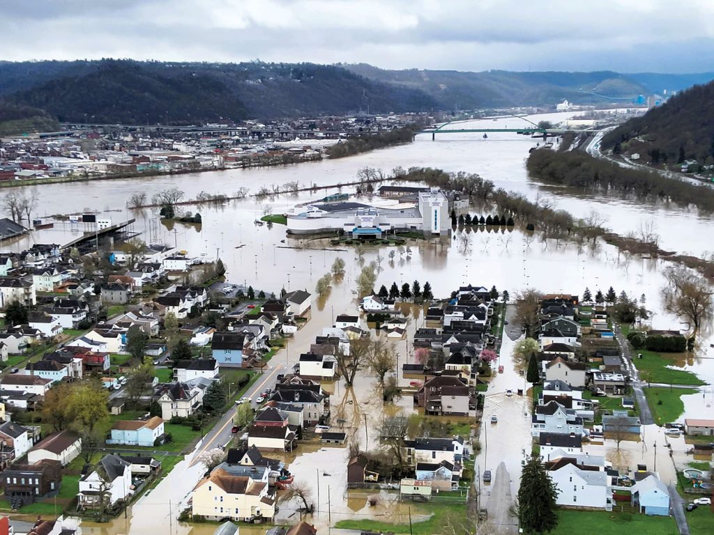 The flood covered roads and surrounded houses on Wheeling Island in Wheeling, W.Va. (Photo courtesy of Wheeling Fire Department)