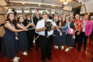 Capt Alan Bernstein of the Belle of Cincinnati accepts the "Loser Antlers" at the award ceremony following this year's Great Steamboat Race. (Photo courtesy Terri Bernstein)