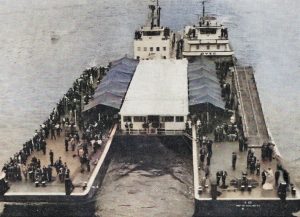 Valvoline (L) and OVEC (R) leading the towboat parade at the Greenup Lock dedication July 22, 1962. (Photo from the July 28, issue of The Waterways Journal)
