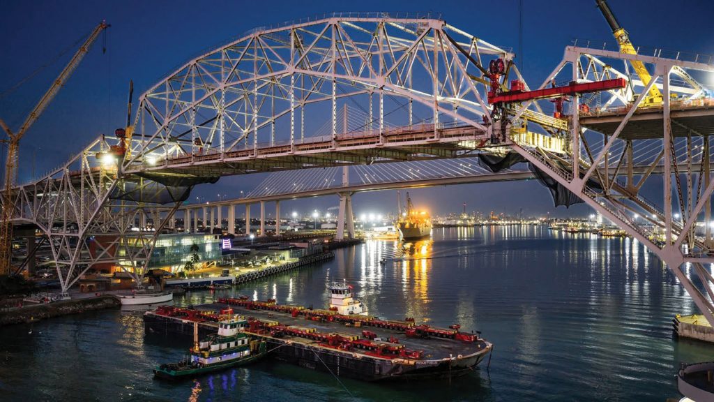 Inclement weather delayed the decommissioning of the center span for several days. Crews worked several hours to detach and lower the span safely onto the Prometheus.