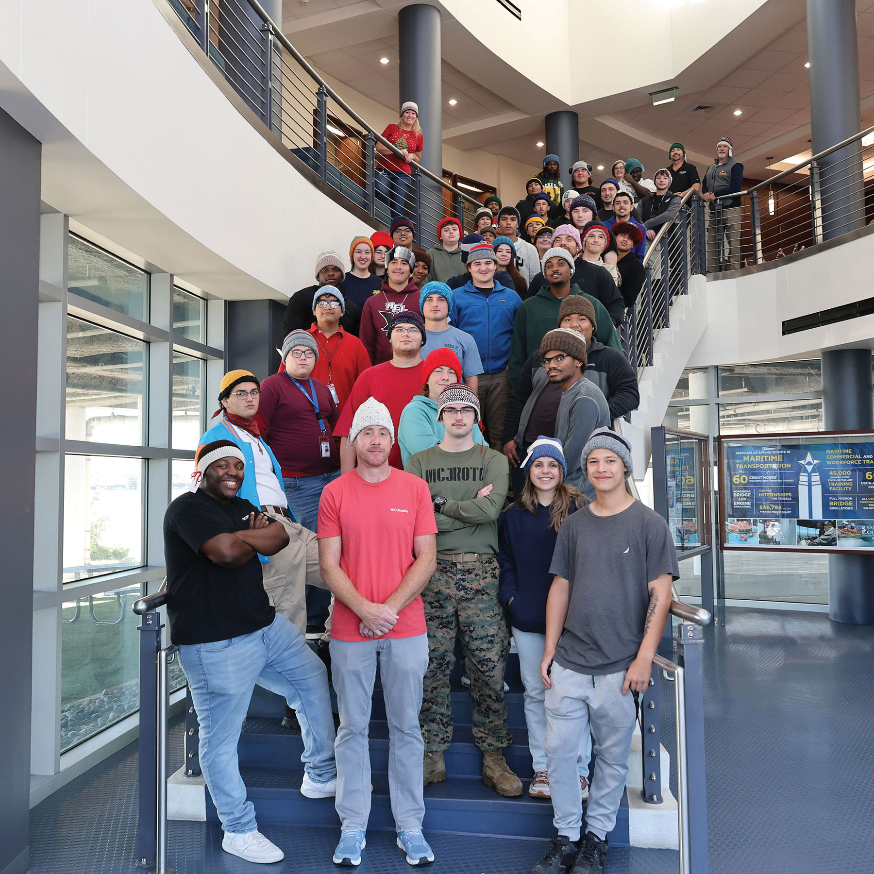 Volunteers Help Pack Holiday Warmth For Mariners