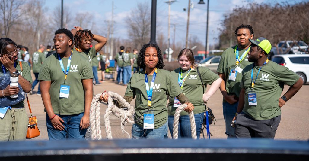 Students take turns at the line-handling station at the We Work The Waterways Industry Interaction Day in Vicksburg, Miss., last February. (Photo courtesy of We Work The Waterways)