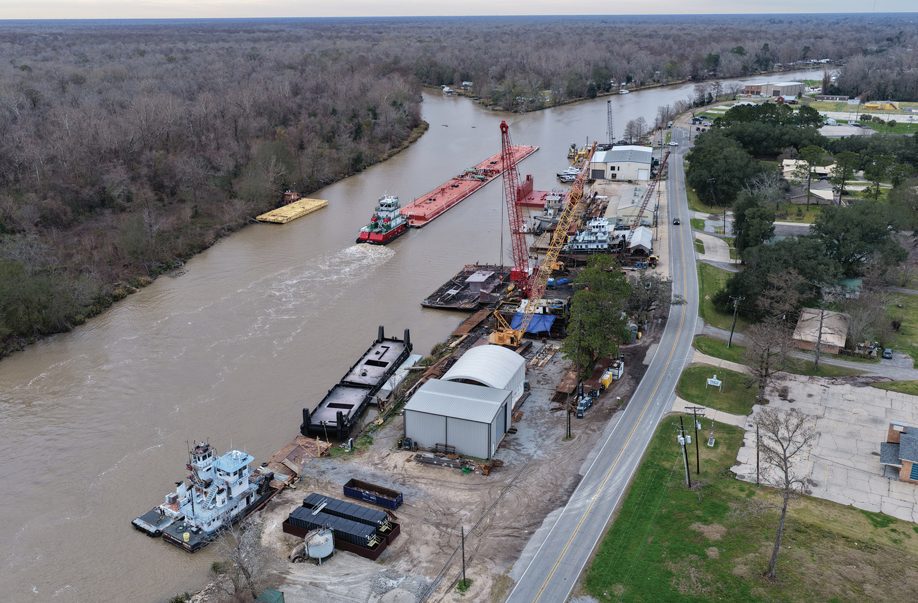 A tow motors past Verret Shipyard, located on the Port Allen Canal in Plaquemine, La. (Photo courtesy of Verret Shipyard)