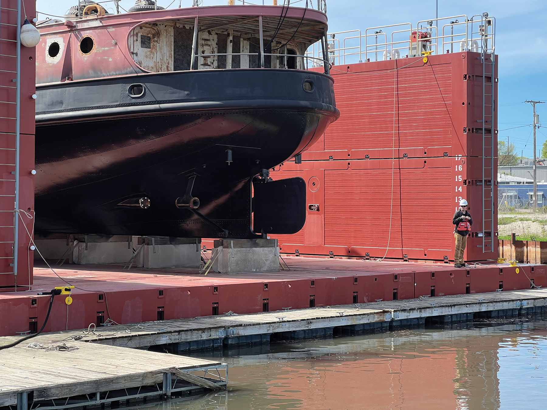 American Ship & Dry-Dock Company’s modular drydock is shown in operation at the company’s shipyard in Milwaukee. Designed for rapid deployment, transportability and expansion, the dry dock features modular components that can be assembled, removed or reconfigured to meet different vessel repair and maintenance needs. (Photo courtesy of Read Development Company Inc.)