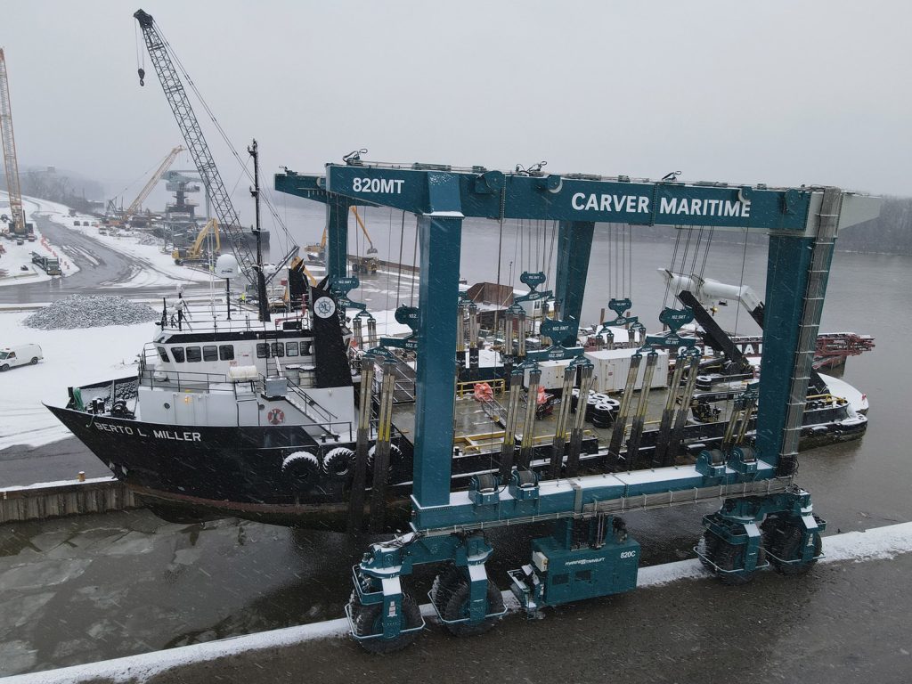 The mv. Berto L. Miller is shown hoisted at Carver Marine Steel Works with the company’s 820-metric-ton Marine Travelift, which expands the yard’s ability to handle vessel and barge repair, maintenance and retrofit projects.